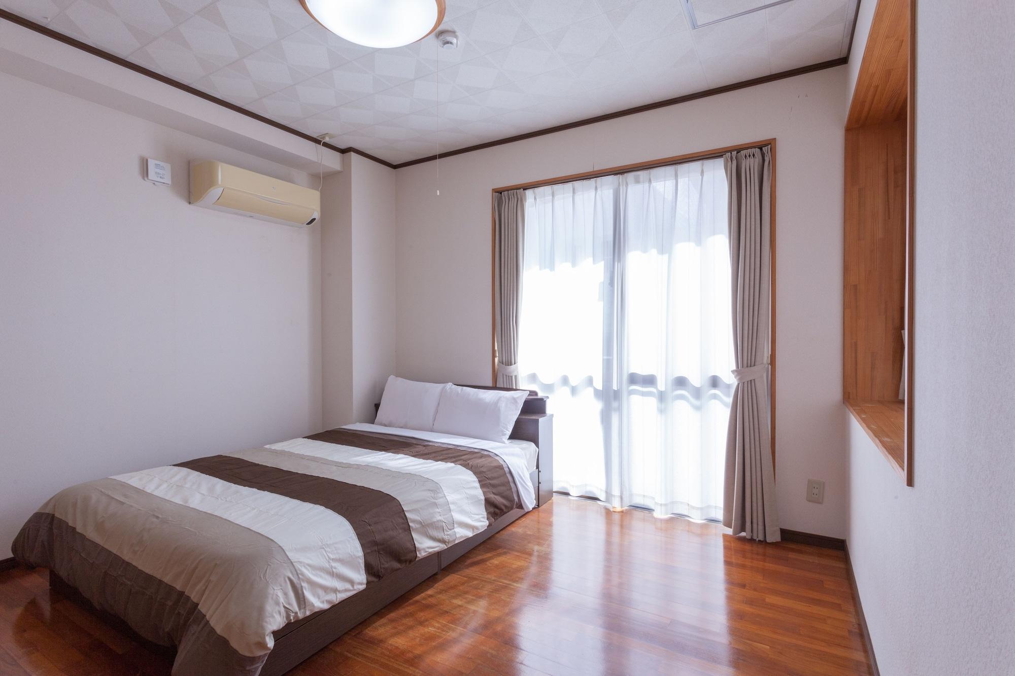 Kariyushi Condominium Resort Sea Side House Nago Buitenkant foto