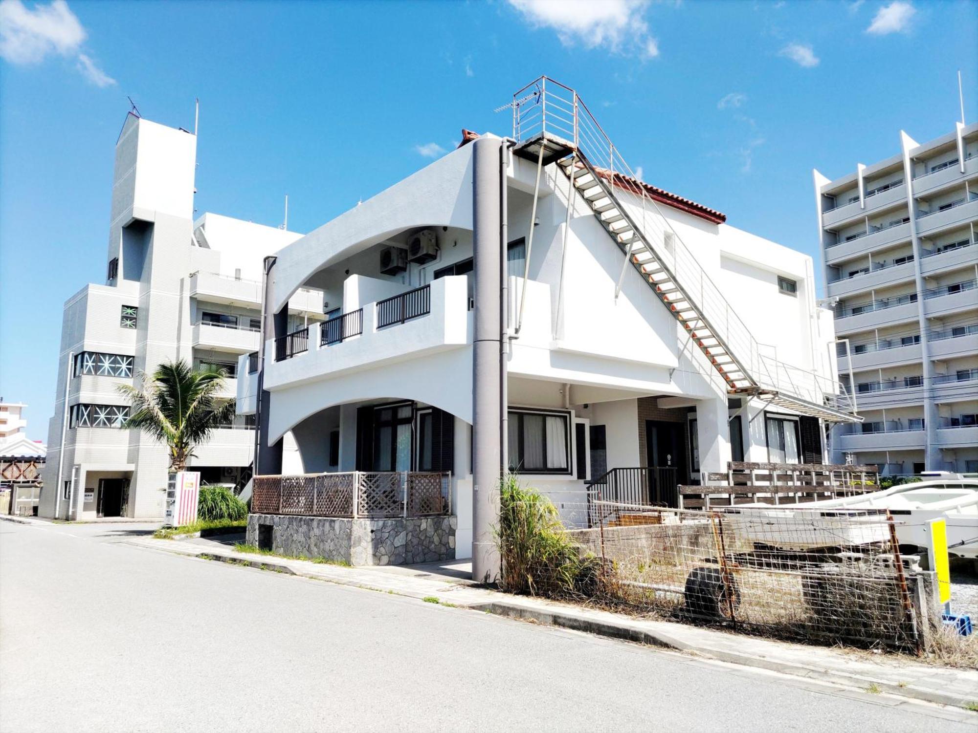 Kariyushi Condominium Resort Sea Side House Nago Buitenkant foto