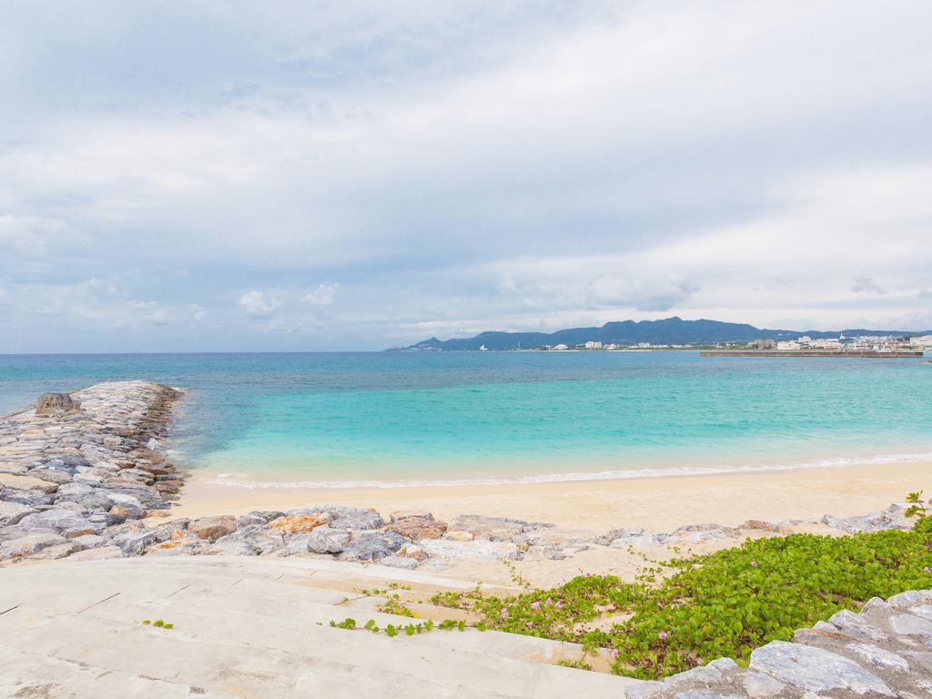 Kariyushi Condominium Resort Sea Side House Nago Buitenkant foto