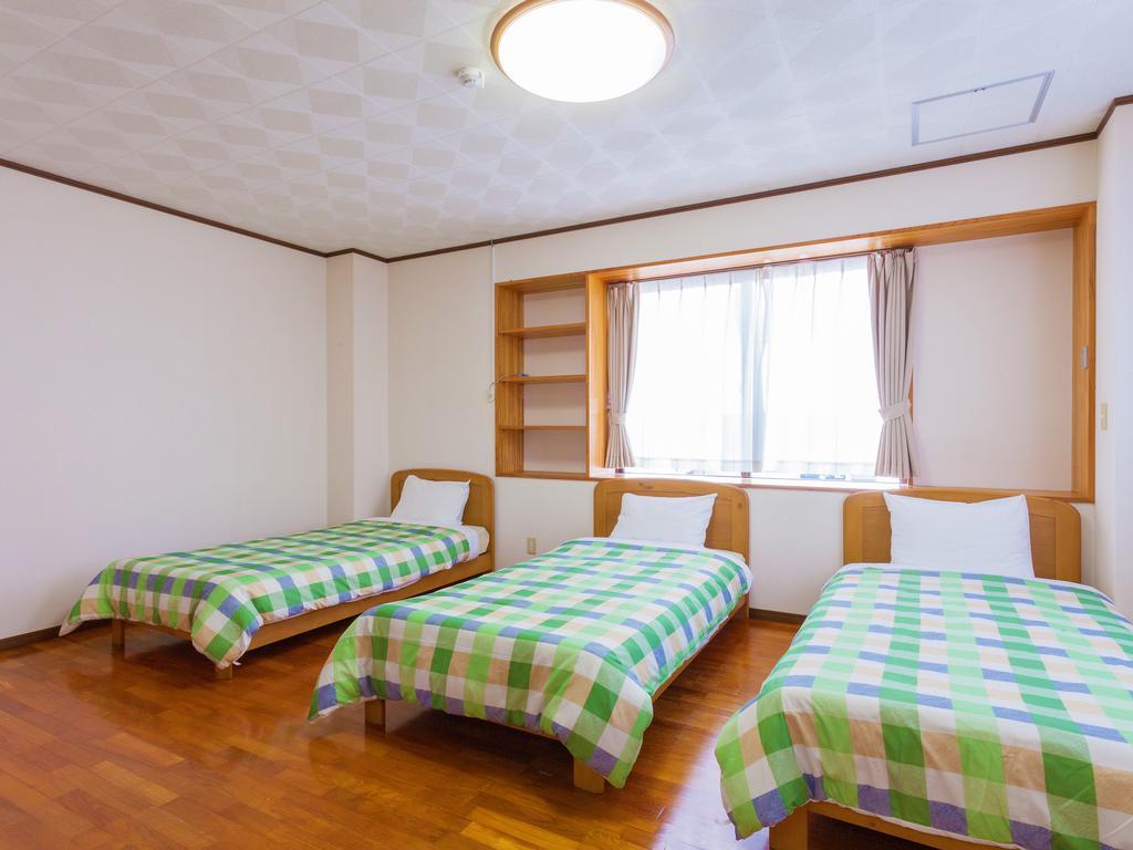 Kariyushi Condominium Resort Sea Side House Nago Buitenkant foto
